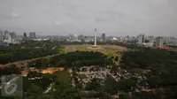 Suasana Taman Monumen Nasional (monas) dari ketinggian di Jakarta, Kamis (29/12). Dalam perayaan itu Pemprov DKI akan menggelar malam bebas kendaraan (Car Free Night) sehingga beberapa jalan akan ditutup. (Liputan6.com/Angga Yuniar)
