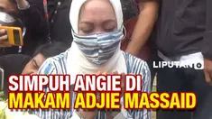 Angelida Sondakh berziarah ke makam sang suami Adjie Massaid di TPU Jeruk Purut Kamis (3/3) siang, tak lama setelah resmi dibebaskan dari lapas Pondok Bambu.
