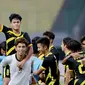 Pemain Malaysia U-19, Haikal Danis, melakuka selebrasi usai mencetak gol ke gawang Vietnam U-19 pada laga semifinal Piala AFF U-19 2022 di Stadion Patriot Candrabhaga, Bekasi, Rabu (13/7/2022). (Bola.com/M Iqbal Ichsan)