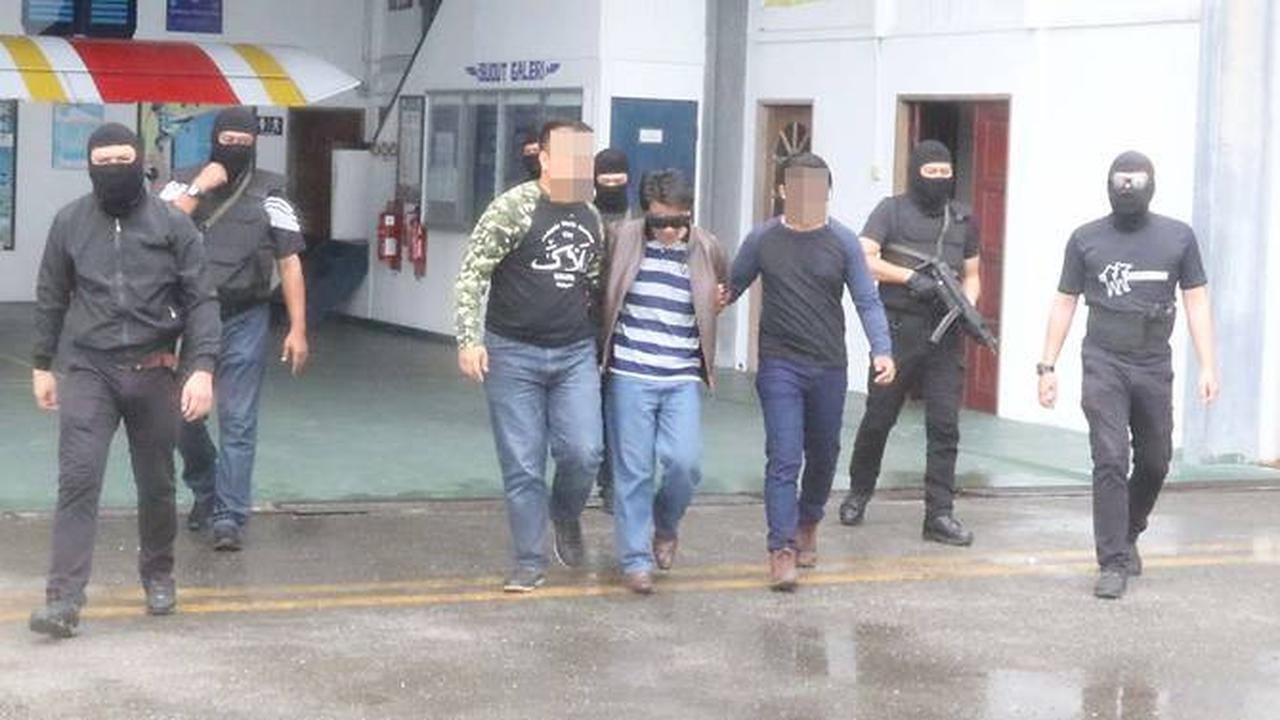 Salah satu terduga teroris yang ditangkap oleh otoritas Malaysia (sumber: Handout, Kepolisian Diraja Malaysia)