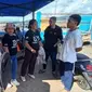 PMI asal Flores Timur, NTT saat dipulangkan melalui pelabuhan laut Maumere, Kabupaten Sikka, NTT (Liputan6.com/Ola Keda)