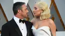 Berpisah sejak beberapa waktu lalu, Lady Gaga dan Taylor Kinney dikabarkan akan segera kembali bertunangan. Berita ini didukung foto Taylor dan ibu Gaga, Cynthia Germanotta di akun Instagram Gaga. (AFP/Bintang.com)