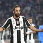  Penyerang Juventus, Gonzalo Higuain memperlihatkan ekspresinya usai mencetak gol ke gawang Napoli, pada laga lanjutan Serie A 2016-2017, di Juventus Stadium, Minggu (30/10/2016) dini hari WIB. Higuan menjadi penentu kemenangan Juventus atas Napoli dengan