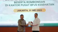 Direktur Utama BPJS Kesehatan, Ghufron Mukti dan  Plh. Gubernur Papua, M. Ridwan Rumasukun/Istimewa.
