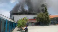 Kebakaran gudang mercon di Tangerang. (Liputan6.com/Pramita Tristiawati)