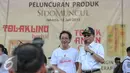 Menhub, Ignasius Jonan memberikan sambutan saat pelapasan mudik gratis bagi pedagang jamu bersama Sido Muncul di kawasan Kemayoran, Jakarta, Minggu (12/7/2015). Para pemudik ini rata-rata penjual jamu, dan pedagang asongan. (Liputan6.com/Faizal Fanani)