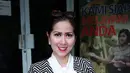 Ditemui usai pelaporannya di Polda Metro Jaya, Senin (4/1/2016), Venna Melinda merasa dirugikan karena telah mencemarkan nama baiknya. Meski memang secara materiil wanita cantik ini tak dirugikan. (Deki Prayoga/Bintang.com)
