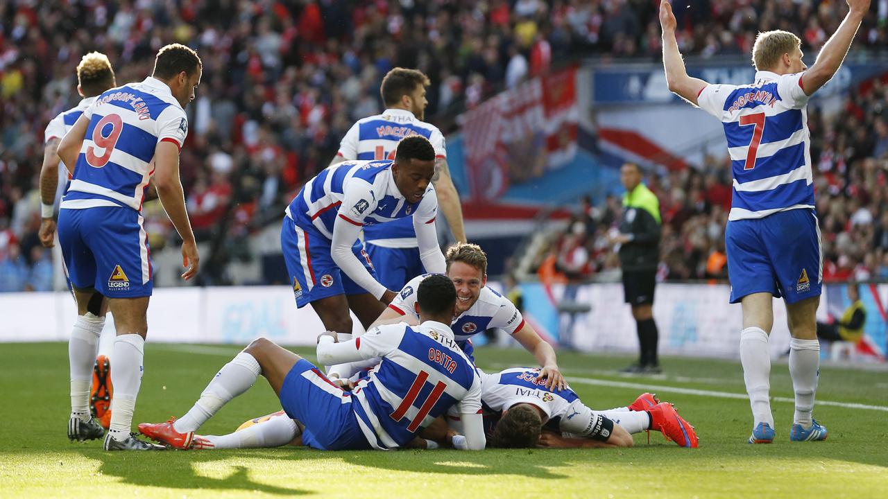 Para pemain Reading merayakan gol ke gawang Arsenal (Reuters)