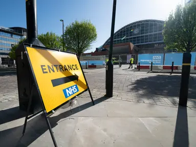 Pemandangan pusat konferensi Manchester Central yang dialihfungsikan menjadi rumah sakit lapangan bernama NHS Nightingale Hospital North West untuk membantu memerangi wabah COVID-19 di Manchester, Inggris, 13 April 2020. Rumah sakit itu dapat menampung hingga 750 pasien. (Xinhua/Jon Super)
