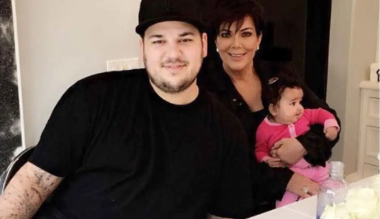 Menjaga anak yang tengah aktif memang efektif untuk menurutnkan berat badan. Rob pun memanfaatkan momen tersebut sambil menikmati waktu bersaama Dream. (People)