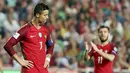 Striker Portugal, Cristiano Ronaldo, tampak kecewa usai gagal membobol gawang Swiss pada laga kualifikasi Piala Dunia 2018 di Stadion Luz, Selasa (10/10/2017). Portugal menang 2-0 atas Swiss.(AP/Armando Franca)