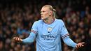Reaksi pemain Manchester City, Erling Haaland pada laga perempat final FA Cup 2022/2023 melawan Burnley yang berlangsung di Etihad Stadium, Manchester, Minggu (19/03/2023) WIB. Haaland sukses mencetak hattrick untuk kemenangan 6-0 The Cityzens. (AFP/Oli Scarff)