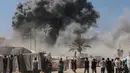 Diketahui, Menara Mushtaha merupakan gedung hunian di bagian barat Kota Gaza yang menampung ratusan warga Palestina yang mengungsi di kawasan padat penduduk. (Omar AL-QATTAA/AFP)