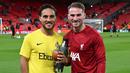 Pemain Liverpool, Alexis Mac Allister (kanan) dan pemain Union Saint-Gilloise, Kevin Mac Allister saat pemanasan menjelang laga Grup E Liga Europa 2023/2024 di Anfield, Liverpool, Inggris, Jumat (6/10/2023) dini hari WIB. (AFP/Oli Scarff)