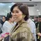 Meutya Hafid, Menteri Komunikasi dan Digital di Kabinet Merah Putih Prabowo-Gibran hadir di kantor Kementerian di Jakarta, Senin (21/10/2024). (Liputan6.com/ Agustin Setyo Wardani)