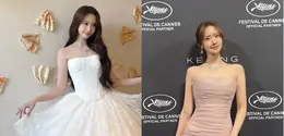 Dari gaun putih megah bak putri dongeng hingga look nude pink yang lembut dan feminin, sang idol sekaligus aktris sukses menunjukkan versatility fashion yang sophisticated di setiap momen Cannes. [@limyoona_official].