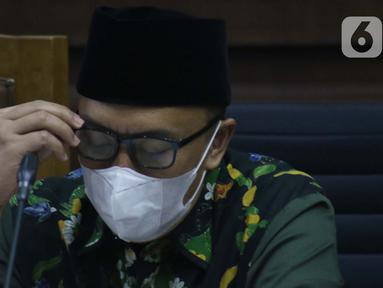 Terdakwa kasus suap dana hibah Kemenpora kepada KONI, Imam Nahrawi saat menjalani sidang lanjutan di Pengadilan Tipikor Jakarta, Rabu (18/3/2020). Sidang lanjutan mantan Menteri Pemuda dan Olahraga Imam Nahrawi ini menyimak keterangan saksi-saksi. (Liputan6.com/Helmi Fithriansyah)