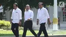 Menteri Sekretaris Negara pada kabinet kerja 2019-2024 Pratikno (tengah) turut hadir ke Istana Kepresidenan, Jakarta, Senin (10/10/2019). Pratikno  datang bersama mantan aktivis Fadjroel Rahman (kanan) dan mantan Staf Khusus Presiden Nico Harjanto. Liputan6.com/Angga Yuniar)