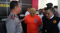 Saat Presiden Jokowi menggalakkan program sertifikat tanah gratis bagi warga, oknum Badan Pertanahan Nasional  (BPN) Gorontalo justru melakukan pungli. (Arfandi Ibrahim/ Liputan6.com).