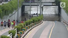 Kondisi terowongan di Jalan Angkasa yang tergenang banjir Jakarta, Selasa (25/2/2020). Hujan yang mengguyur Jakarta sejak Senin (24/2) malam membuat sejumlah kali meluap dan menyebabkan banjir di terowongan tersebut. (Liputan6.com/Helmi Fithriansyah)