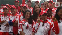 Sejumlah atlet perempuan berpose saat pelepasan Kontingen Indonesia untuk SEA Games 2019 Filipina di Istana Bogor, Jawa Barat, Rabu (27/11/2019). Sebanyak 841 atlet Indonesia akan berlaga di 52 cabang olahraga pada ajang multievent olahraga terbesar se-Asia Tenggara. (Liputan6.com/Angga Yuniar)