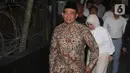 Penasihat Khusus Presiden Bidang Haji, Muhadjir Effendy, saat memasuki area Gedung Merah Putih Komisi Pemberantasan Korupsi (KPK), Jakarta, Senin (18/5/2026). (Liputan6.com/Helmi Fithriansyah)