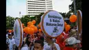 Aksi Ikatan Alumni Gizi (IKAZI) dalam meramaikan kegiatan Ayo Melek Gizi di kawasan Bundaran HI, Jakarta, Minggu (25/1/2015). (Liputan6.com/Faizal Fanani)