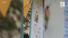 Seorang pria menguji kemampuan wall climbing atau panjat dinding. Tak disangka, dia berhasil memanjat hanya dalam hitungan detik.