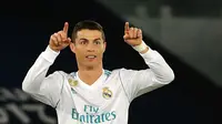 Cristiano Ronaldo tak menutup peluang untuk pensiun bersama Real Madrid, namun menyerahkan segala hal soal masa depannya kepada pihak klub.(AFP/Karim Sahib)