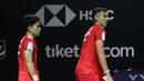 Ganda putra Indonesia, Leo Carnando/Bagas Maulana tampak lesu setelah ditaklukkan Fajar Alfian/Muhammad Fikri dalam babak 16 besar Indonesia Masters 2026 di Istora Senayan, Jakarta, Kamis (22/1/2026). (Bola.com/M Iqbal Ichsan)