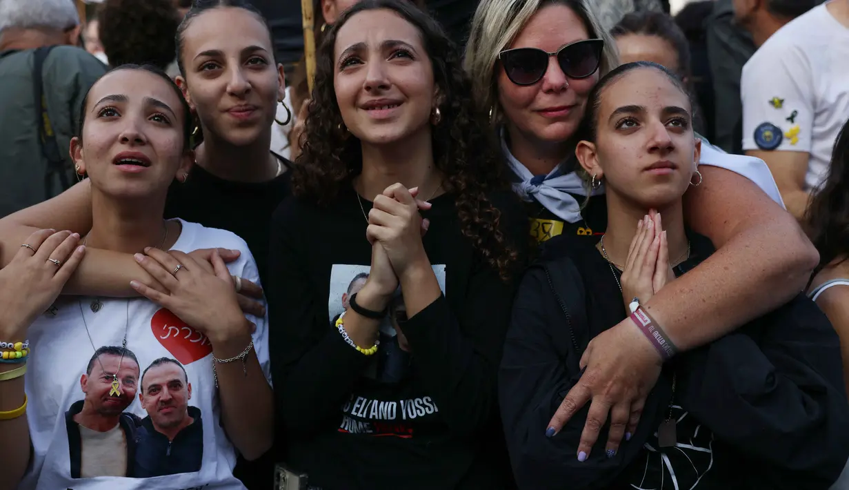 Dikabarkan akan ada tiga gelombang pembebasan sandera oleh Hamas yaitu pada pukul 08.00 waktu setempat di dua lokasi, berikutnya akan dilaksanakan pada pukul 09.00 waktu setempat atau 14.00 WIB di lokasi berbeda. (AHMAD GHARABLI/AFP)