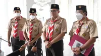 Presiden Joko Widodo atau Jokowi menerima kunjungan perwakilan Kwartir Nasional (Kwarnas) Gerakan Pramuka di Istana Merdeka Jakarta, Jumat (12/8/2022).