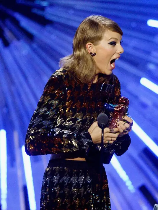 Setelah mengetahui keputusan atas kemenangan yang diterimanya, Taylor pun memberikan tanggapannya. Ia mengucapkan terima kasih kepada semua pihak yang telah memberikan dukungan. (AFP/Kevork Djansezian)