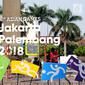 Pekerja menyelesaikan pemasangan logo Asian Games 2018 di kawasan Bundaran Hotel Indonesia, Jakarta, Rabu (16/8). Jelang peluncuran hitung mundur Asian Games 2018 pemasangan karakter cabang olahraga dipercepat. (Liputan6.com/Helmi Fithriansyah)