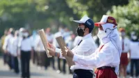 457 Tim siswa satgas sekolah jelang dimulainya Pembelajaran Tatap Muka terbatas di Surabaya. (Dian Kurniawan/Liputan6.com)