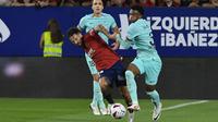 Kali ini dua gol kemenangan Barca dicetak oleh Jules Kounde (45+1') dan penalti Robert Lewandowski (85'). (AP Photo/Alvaro Barrientos)