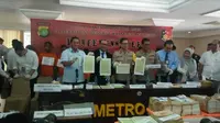 Direktorat Reserse Kriminal Khusus Polda Metro Jaya meringkus jaringan penerbit meterai palsu yang diedarkan secara online. (Foto: Merdeka.com/Dwi Aditya Putra)