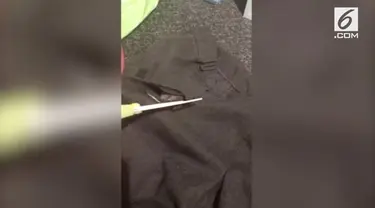 Seorang ibu menemukan seekor tikus mati terjahit dalam liptan rok sekolah anaknya