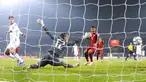 Pemain Jerman Kai Havertz (kiri) mencetak gol ke gawang Armenia yang dijaga kiper Stanislav Buchnev pada pertandingan sepak bola Kualifikasi Grup J Piala Dunia 2022 di Stadion Vazgen Sargsyan, Yerevan, Armenia, 14 November 2021. Jerman menang 4-1. (AP Photo/Hakob Berberyan)
