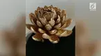 Seniman asal India membuat cincin bertatahkan 6.690 berlian yang berhasil memecahkan rekor dunia, Guinness World Records.