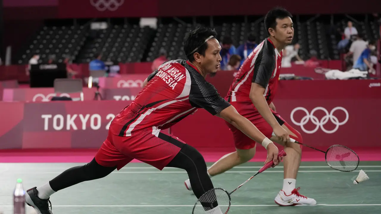 Foto: Hendra Setiawan/Mohammad Ahsan Menutup Hegemoni Tim Bulu Tangkis Indonesia di Hari Pertama Olimpiade Tokyo 2020