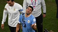 Sedangkan Uruguay harus menangis setelah kemenangan 2-0 atas Ghana tak berarti apa-apa. (AFP/Philip Fong)
