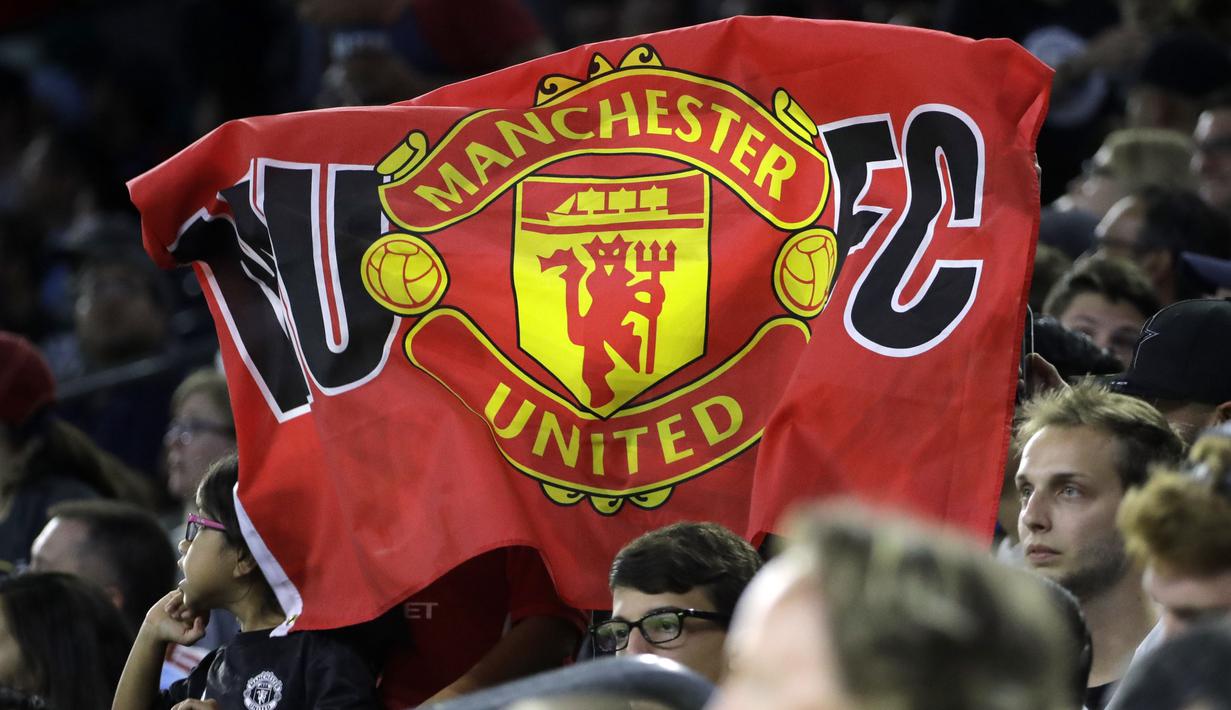 Fans Manchester United membentangkan banner saat timnya melawan Manchester City pada laga International Champions Club di NRG Stadium, Houston, (20/7/2017).MU menang 2-0. (AP/David J. Phillip)