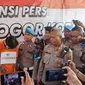 Polresta Bogor Kota mengungkap kasus pembunuhan terhadap pacarnya sendiri yang jasadnya disimpan di ruko kosong. (Liputan6.com/Achmad Sudarno)