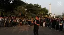 Aktivis Jaringan Solidaritas Korban untuk Keadilan (JSKK) menggelar aksi Kamisan ke-589 di depan Istana Merdeka, Jakarta, Kamis (20/6/2019). Dalam aksinya, JSKK meminta Presiden Joko Widodo juga menghapus impunitas sebagaimana tercantum dalam Nawacita. (Liputan6.com/Johan Tallo)