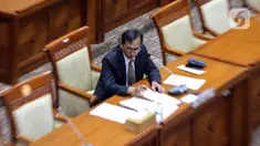 Hakim Tinggi Badan Pengawasan Mahkamah Agung Annas Mustaqim mengikuti seleksi Hakim Agung di ruang sidang Komisi III DPR, Kompleks Parlemen, Senayan, Jakarta, Selasa (28/3/2023). (Liputan6.com/Faizal Fanani)