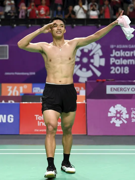 Selebrasi pebulu tangkis Indonesia, Jonatan Christie usai mengalahkan Chou Tienchen asal Chinese Taipei laga pada final tunggal putra Asian Games 2018 di Jakarta, Selasa (28/8). (ANTARA FOTO/INASGOC/Puspa Perwitasari/tom/18)