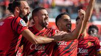 Selebrasi para pemain Real Mallorca setelah Vedad Muriqi (paling kiri) mencetak gol ke gawang Real Madrid pada lanjutan La Liga 2022/2023, Minggu (5/2/2023) malam WIB. (twitter/RCD_Mallorca)