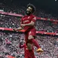 Pemain Liverpool, Mohamed Salah merayakan gol kemenangan timnya pada laga pekan ke-32 Liga Inggris 2022/2023 di Anfield, Liverpool, Sabtu (22/04/2023) WIB. The Reds berhasil menang dengan skor 3-2. (AFP/Paul Ellis)