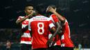Pemain Madura United merayakan gol ke gawang Deltras dalam laga Trofeo Kapolda Jatim di Stadion Gelora Delta, Sidoarjo, Minggu (24/4/2016). (Bola.com/Zulfirdaus Harahap)